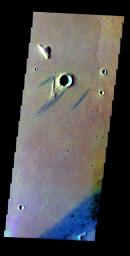 The THEMIS VIS camera contains 5 filters. The data from different filters can be combined in multiple ways to create a false color image. This false color image from NASA's 2001 Mars Odyssey spacecraft shows windstreaks around an unnamed crater.