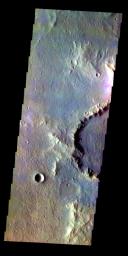 The THEMIS VIS camera contains 5 filters. The data from different filters can be combined in multiple ways to create a false color image. This false color image from NASA's 2001 Mars Odyssey spacecraft shows part of the floor of Muller Crater.