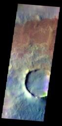 The THEMIS VIS camera contains 5 filters. The data from different filters can be combined in multiple ways to create a false color image. This image from NASA's 2001 Mars Odyssey spacecraft shows a crater and its ejecta on the floor of Tikhov Crater.