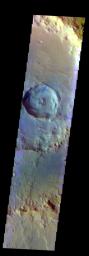 The THEMIS VIS camera contains 5 filters. The data from different filters can be combined in multiple ways to create a false color image. This image from NASA's 2001 Mars Odyssey spacecraft shows a crater within a crater on the floor of Hadley Crater.