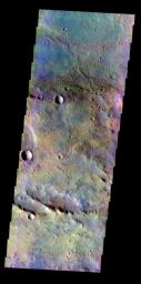 The THEMIS VIS camera contains 5 filters. The data from different filters can be combined in multiple ways to create a false color image. This false color image from NASA's 2001 Mars Odyssey spacecraft shows a portion of the plains in Terra Sabaea.