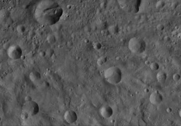 This image of Octavia AV-L-19, from the atlas of the giant asteroid Vesta, was created from images taken as NASA's Dawn mission flew around the object, also known as a protoplanet.