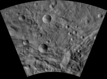 This image of Sextilia AV-L-26, from the atlas of the giant asteroid Vesta, was created from images taken as NASA's Dawn mission flew around the object, also known as a protoplanet.