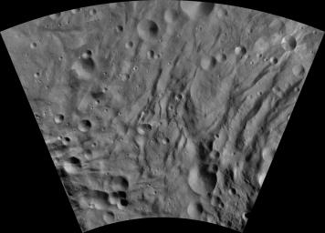 This image of Canuleia AV-L-28, from the atlas of the giant asteroid Vesta, was created from images taken as NASA's Dawn mission flew around the object, also known as a protoplanet.
