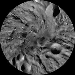 This image of Rheasilvia AV-L-30, from the atlas of the giant asteroid Vesta, was created from images taken as NASA's Dawn mission flew around the object, also known as a protoplanet.