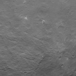 This image, taken on June 18, 2015 by NASA's Dawn spacecraft, shows dwarf planet Ceres from an altitude of 2,700 miles (4,400 kilometers) -- a mountain 3 miles (5 kilometers) high, surrounded by relatively smooth terrain, can be seen here.