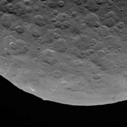 This image, taken on June 18, 2015 by NASA's Dawn spacecraft, shows dwarf planet Ceres from an altitude of 2,700 miles (4,400 kilometers) -- a mountain 3 miles (5 kilometers) high, surrounded by relatively smooth terrain, can be seen here.