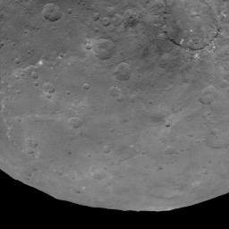 This image, taken on June 9, 2015 by NASA's Dawn spacecraft, shows Dantu crater on Ceres, at upper right, from an altitude of 2,700 miles (4,400 kilometers). North on Ceres is toward upper right.