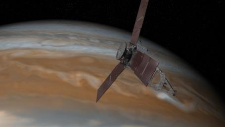 This artist's rendering shows NASA's Juno spacecraft making one of its close passes over Jupiter. Launched in 2011, the Juno spacecraft will arrive at Jupiter in 2016 to study the giant planet from an elliptical, polar orbit.