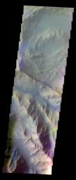 The THEMIS VIS camera contains 5 filters. The data from different filters can be combined in multiple ways to create a false color image. This image from NASA's 2001 Mars Odyssey spacecraft shows part of Coprates Chasma.