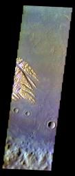 The THEMIS VIS camera contains 5 filters. The data from different filters can be combined in multiple ways to create a false color image. This image from NASA's 2001 Mars Odyssey spacecraft shows part of the floor of Pollack Crater.