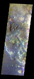 The THEMIS VIS camera contains 5 filters. The data from different filters can be combined in multiple ways to create a false color image. This image from NASA's 2001 Mars Odyssey spacecraft shows where Mawrth Vallis empties into Chryse Planitia.