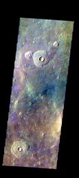 The THEMIS VIS camera contains 5 filters. The data from different filters can be combined in multiple ways to create a false color image. This image from NASA's 2001 Mars Odyssey spacecraft shows part part of Acidalia Planitia.