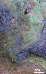 This view combines information from two instruments on NASA's Mars Reconnaissance Orbiter to map color-coded composition over the shape of the ground in a small portion of the Nili Fossae plains region of Mars' northern hemisphere.