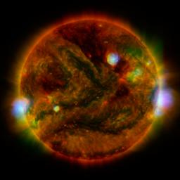 Flaring, active regions of our sun are highlighted in this image combining observations from several telescopes. During the observations, microflares went off, which are smaller versions of the larger flares that also erupt from the sun's surface.