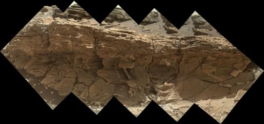 A rock outcrop dubbed 'Missoula,' near Marias Pass on Mars, is seen in this image mosaic taken by NASA's Curiosity rover. Pale mudstone (bottom of outcrop) meets coarser sandstone (top) in this geological contact zone.