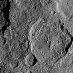 This image, taken by NASA's Dawn spacecraft, shows a portion of the southern hemisphere of dwarf planet Ceres from an altitude of 915 miles (1,470 kilometers). The image, with a resolution of 450 feet (140 meters) per pixel, was taken on August 21, 2015.