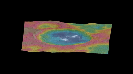 This still from an animation, made using images taken by NASA's Dawn spacecraft, features a color-coded topographic map of Occator crater on Ceres.