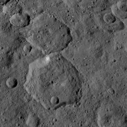 This image, taken by NASA's Dawn spacecraft, shows the surface of dwarf planet Ceres from an altitude of 915 miles (1,470 kilometers). The image was taken on September 9, 2015, and has a resolution of 450 feet (140 meters) per pixel.