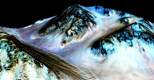 Dark, narrow streaks on Martian slopes such as these at Hale Crater are inferred to be formed by seasonal flow of water on contemporary Mars as seen by NASA's Mars Reconnaissance Orbiter.