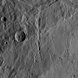 This image, taken by NASA's Dawn spacecraft, shows the surface of dwarf planet Ceres from an altitude of 915 miles (1,470 kilometers). The image was taken on September 15, 2015, and has a resolution of 450 feet (140 meters) per pixel.