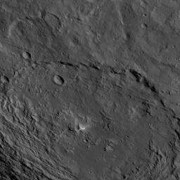 This image, taken by NASA's Dawn spacecraft, shows a portion of the southern hemisphere of dwarf planet Ceres from an altitude of 915 miles (1,470 kilometers). Urvara crater, named for the Indian and Iranian deity of plants and fields, is featured.