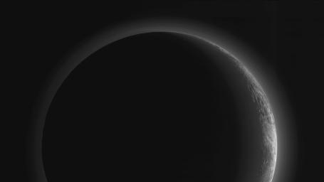 This image was made just 15 minutes after NASA's New Horizons spacecraft's closest approach to Pluto on July 14, 2015, as the spacecraft looked back at Pluto toward the sun.