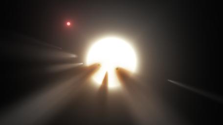 Using data from NASA's Kepler and Spitzer Space Telescopes, this artist's concept shows a star behind a shattered comet.