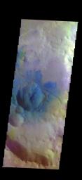 The THEMIS VIS camera contains 5 filters. Data from the filters can be used in many ways to create a false color image. This image from NASA's 2001 Mars Odyssey spacecraft shows small dunes and sand located in and around an unnamed crater in Arabia Terra.