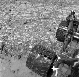 NASA's Curiosity Mars rover used its Navigation Camera (Navcam) to capture this view partway back down a slope it climbed toward 'Marias Pass' on lower Mount Sharp. The image was taken May 22, 2015.