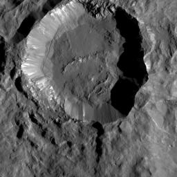 Kupalo Crater, taken Dec. 21, 2016 by NASA's Dawn spacecraft, shows one of the youngest craters on Ceres. The crater has bright material exposed on its rim and walls, which could be salts. Its flat floor likely formed from impact melt and debris.