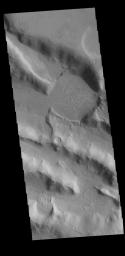 This image captured by NASA's 2001 Mars Odyssey spacecraft shows a small portion of the boundary region between Terra Sabaea and Utopia Planitia.