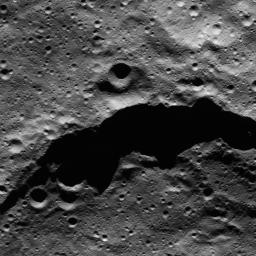 The image from NASA's Dawn spacecraft shows the northeast rim of Sintana Crater on Ceres. The crater's steep rim is shadowed in this particular view.