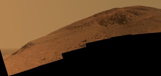 This scene from NASA's Mars Exploration Rover Opportunity looks upward at 'Knudsen Ridge' on the southern edge of 'Marathon Valley' from inside the valley.