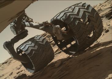 The team operating NASA's Curiosity Mars rover uses the Mars Hand Lens Imager (MAHLI) camera on the rover's arm to check the condition of the wheels at routine intervals.