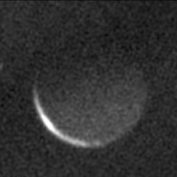 After its close approach to Pluto in July 2015, NASA's New Horizons spacecraft snapped this hauntingly beautiful image of the night side of Pluto's largest moon, Charon.