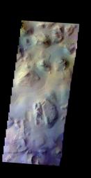 The THEMIS camera contains 5 filters. The data from different filters can be combined in multiple ways to create a false color image. This image from NASA's 2001 Mars Odyssey spacecraft shows a region of chaos in Eos Chasma.