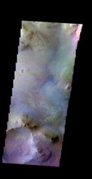 The THEMIS camera contains 5 filters. The data from different filters can be combined in multiple ways to create a false color image. This image from NASA's 2001 Mars Odyssey spacecraft shows part of the floor of Coprates Chasma.