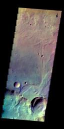 The THEMIS camera contains 5 filters. The data from different filters can be combined in multiple ways to create a false color image. This image from NASA's 2001 Mars Odyssey spacecraft shows part of Tyrrhena Terra.