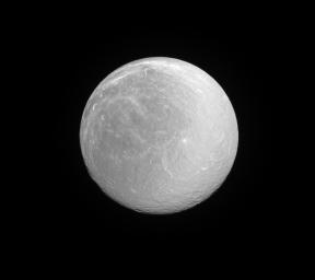 Rhea, like many moons in the outer solar system, appears dazzlingly bright in full sunlight. This is the signature of the water ice that forms most of the moon's surface, as seen by NASA's Cassini spacecraft.