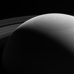 This view, seen by NASA's Cassini spacecraft, shows Saturn's daylit side, which no Earth-based telescope could capture. A spacecraft in orbit, like Cassini, can capture stunning scenes that would be impossible from our home planet.