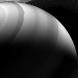 When imaged by NASA's Cassini spacecraft at infrared wavelengths that pierce the planet's upper haze layer, the high-speed winds of Saturn's atmosphere produce watercolor-like patterns.