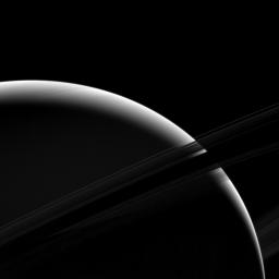 Although only a sliver of Saturn's sunlit face is visible in this view, the mighty gas giant planet still dominates the view captured by NASA's Cassini spacecraft.