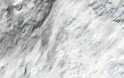 This image from NASA's Mars Reconnaissance Orbiter covers part of the chaotic terrain in Masursky Crater, and was targeted due to evidence that ejecta from Mojave Crater, to the south, may have modified the landscape.