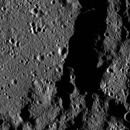 This view from NASA's Dawn spacecraft shows a portion of Mondamin Crater, an impact feature 78 miles (126 kilometers) in diameter, in the southern hemisphere of Ceres.