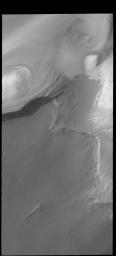 This image captured by NASA's 2001 Mars Odyssey spacecraft shows part of Boreum Cavus, at the interior end of Chasma Boreale.