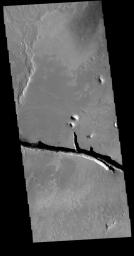This image captured by NASA's 2001 Mars Odyssey spacecraft shows a portion of Cerberus Fossae.