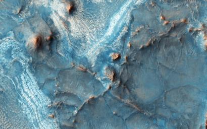 The Nili Fossae region, located on the northwest rim of Isidis impact basin, is one of the most colorful regions of Mars, as seen here by NASA's Mars Reconnaissance Orbiter spacecraft.