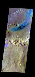 The THEMIS camera contains 5 filters. The data from different filters can be combined in multiple ways to create a false color image. This image from NASA's 2001 Mars Odyssey spacecraft shows part of the floor of Vernal Crater.