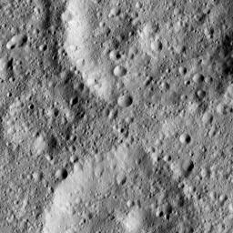 The scene shows a complex of craters in mid-southern latitudes on Ceres, just west of the peaks known as Niman Rupes. NASA's Dawn spacecraft took this image on June 15, 2016.
